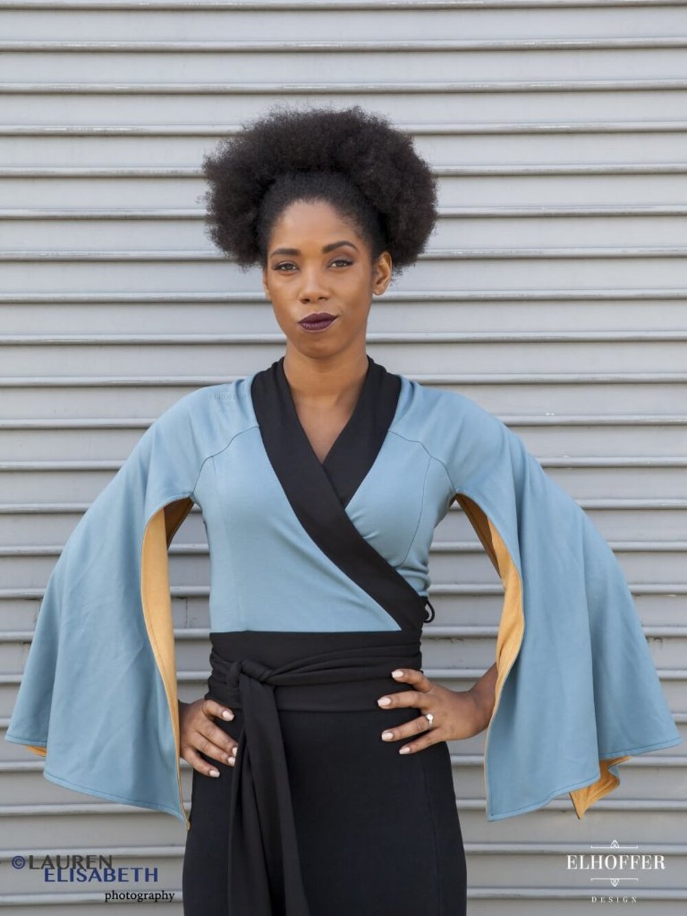 Elhoffer Design Light Blue Wrap Top with Black Trim and Dramatic Cape Sleeves